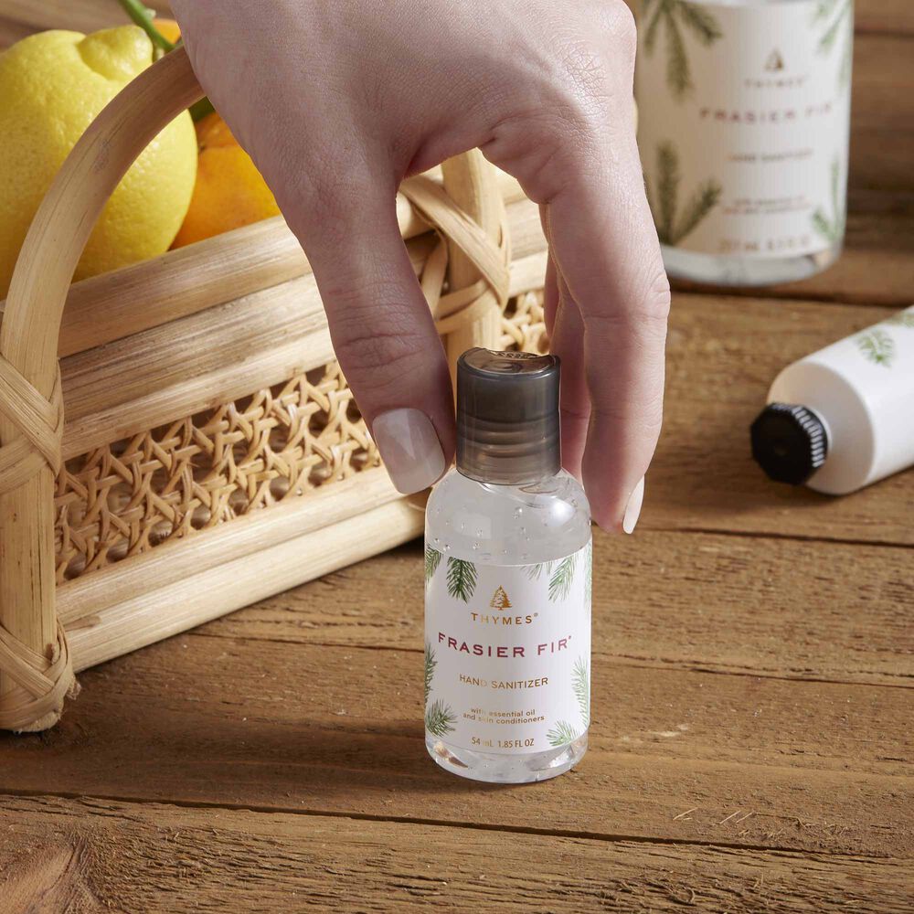 Hand Touching Thymes Frasier Fir Travel Hand Sanitizer image number 1